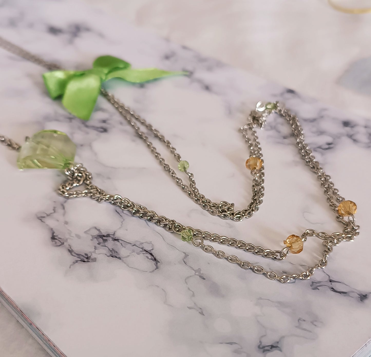 Collier Sautoir avec perle et Noeud